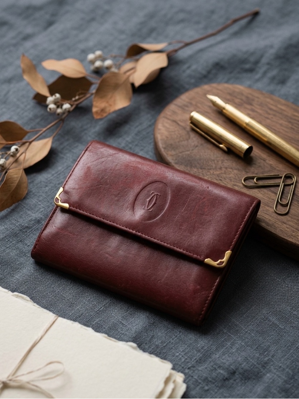 Vintage Must de Cartier Burgundy Leather Kisslock Tri-Fold Wallet